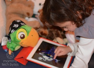 My daughter examines her parrot and circles what's wrong with him on his X-Ray.